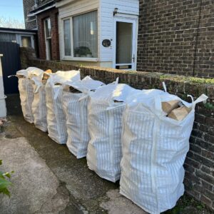 KILN DRIED ASH LOGS – 1 X BARROW BAG